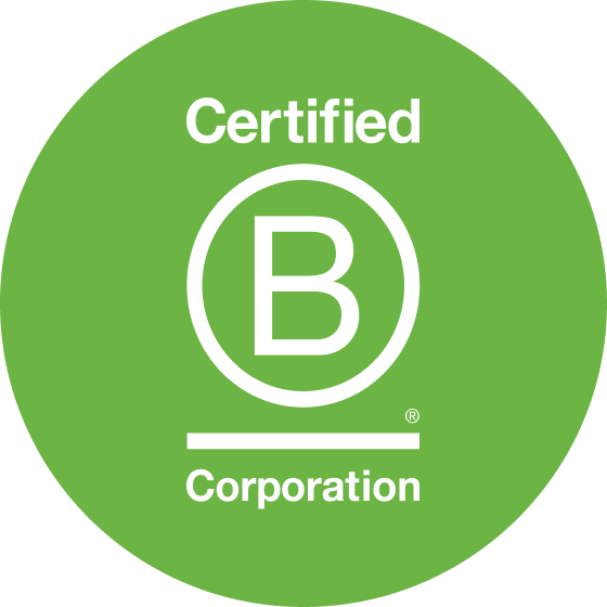 white b corp logo in green circle