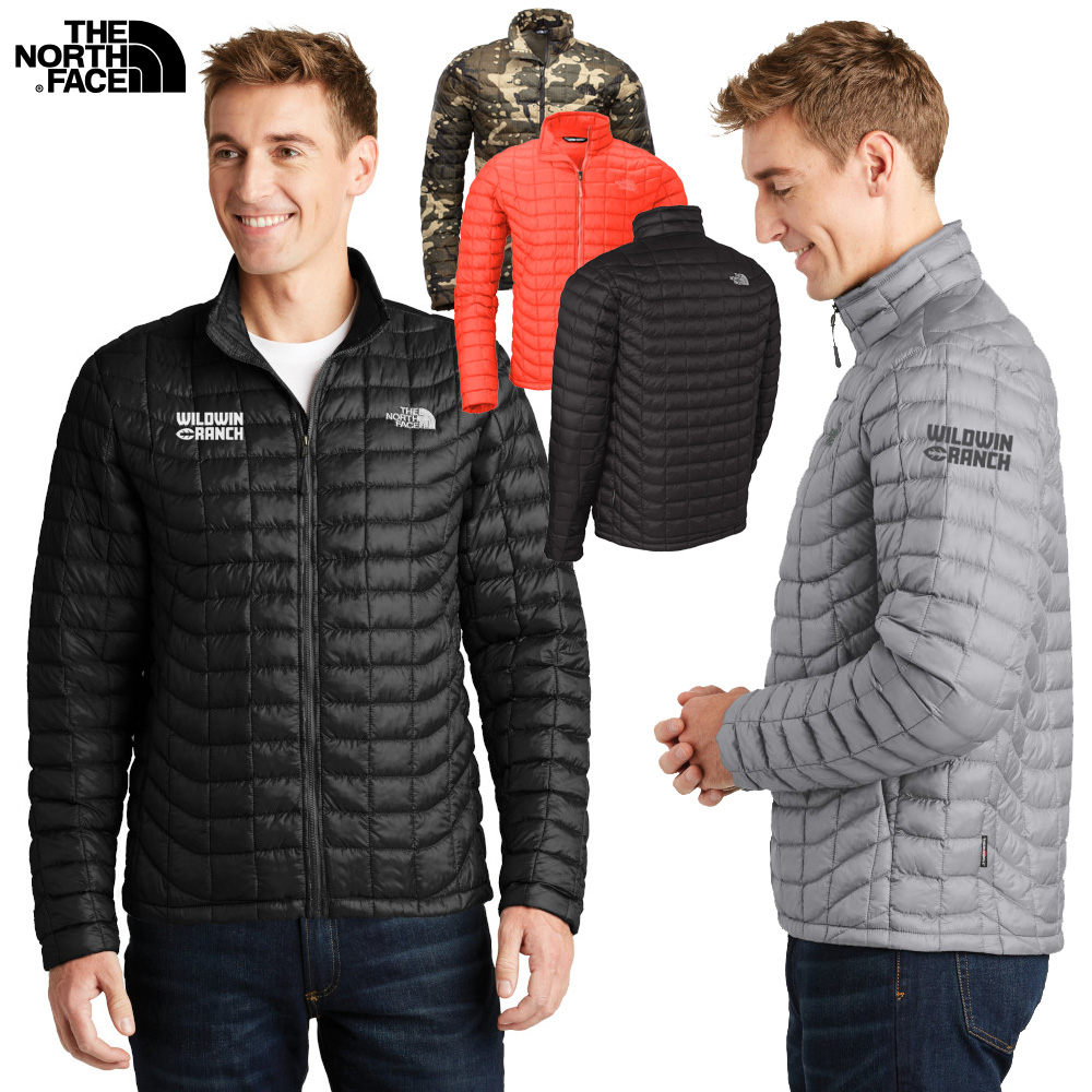 male model wearing North Face® thermal packable jacket in black and gray