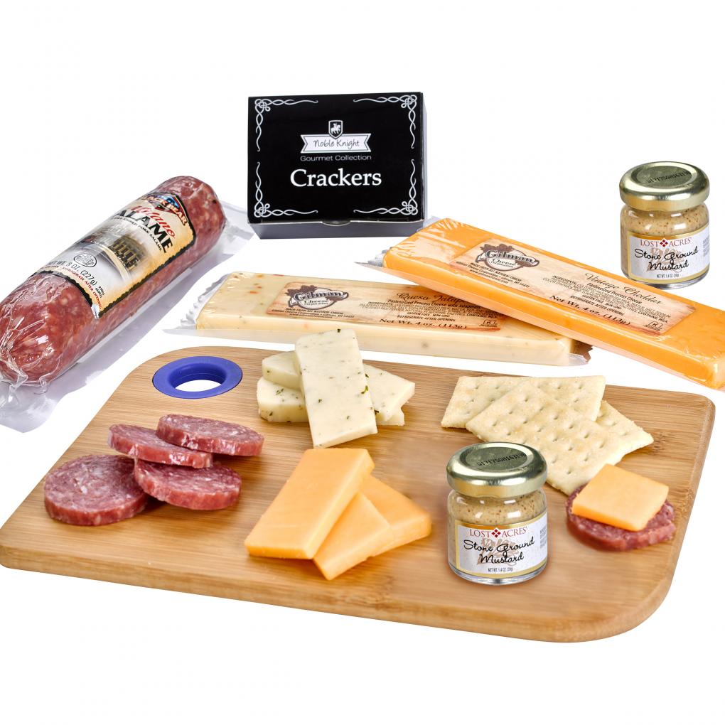 amboo charcuterie board with various cheeses and cold cuts